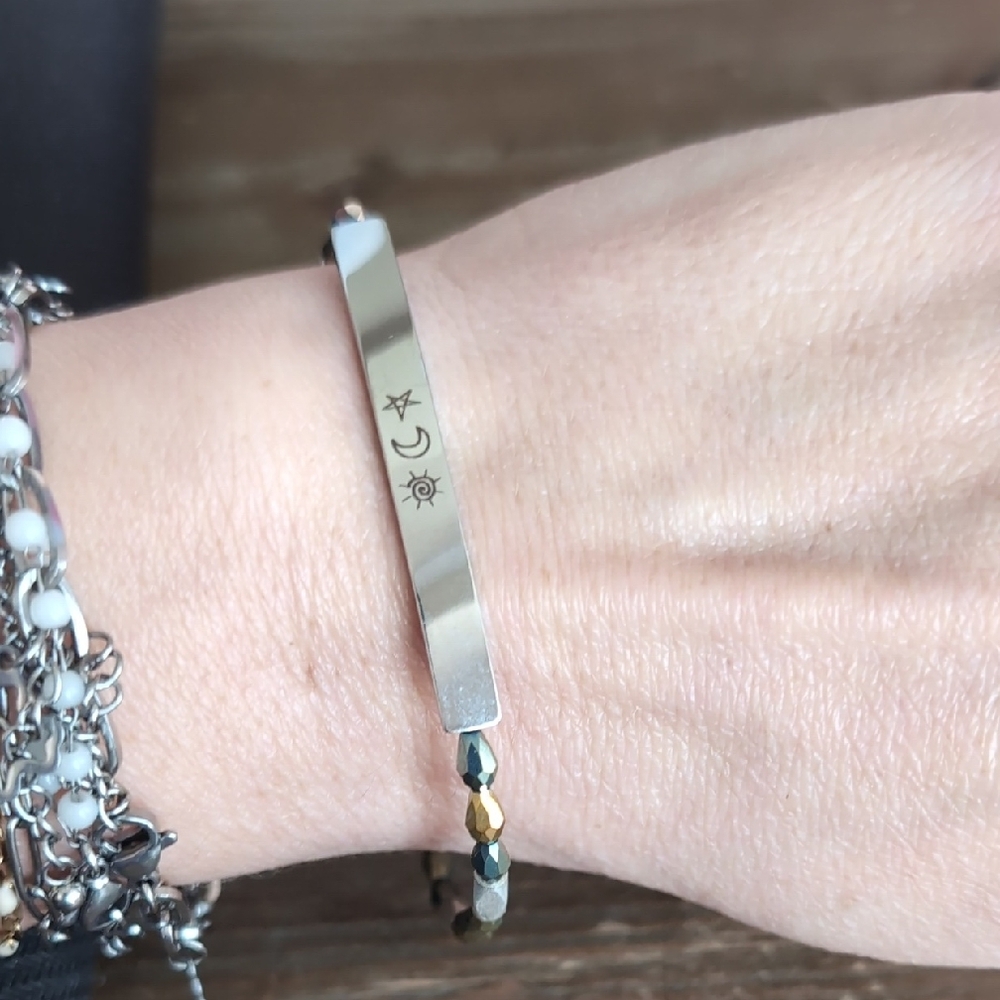 Silver Bracelet with Moon and Star Design
